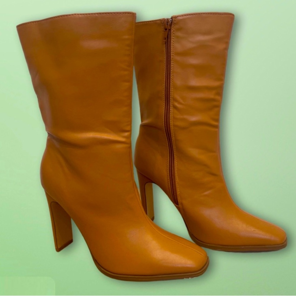 High Top Brown Heel Boots
Size 8
The perfect fall boot! 
4” heel